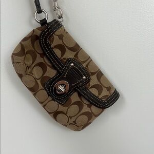 Coach Signature Brown and Tan Clutch